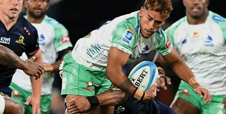 Fijian Drua first-five eighth Isaiah Armstrong-Ravula is tackled against the Highlanders at the Forsyth Barr Stadium in Dunedin, New Zealand, on April 12, 2025. Photo: The Stuff