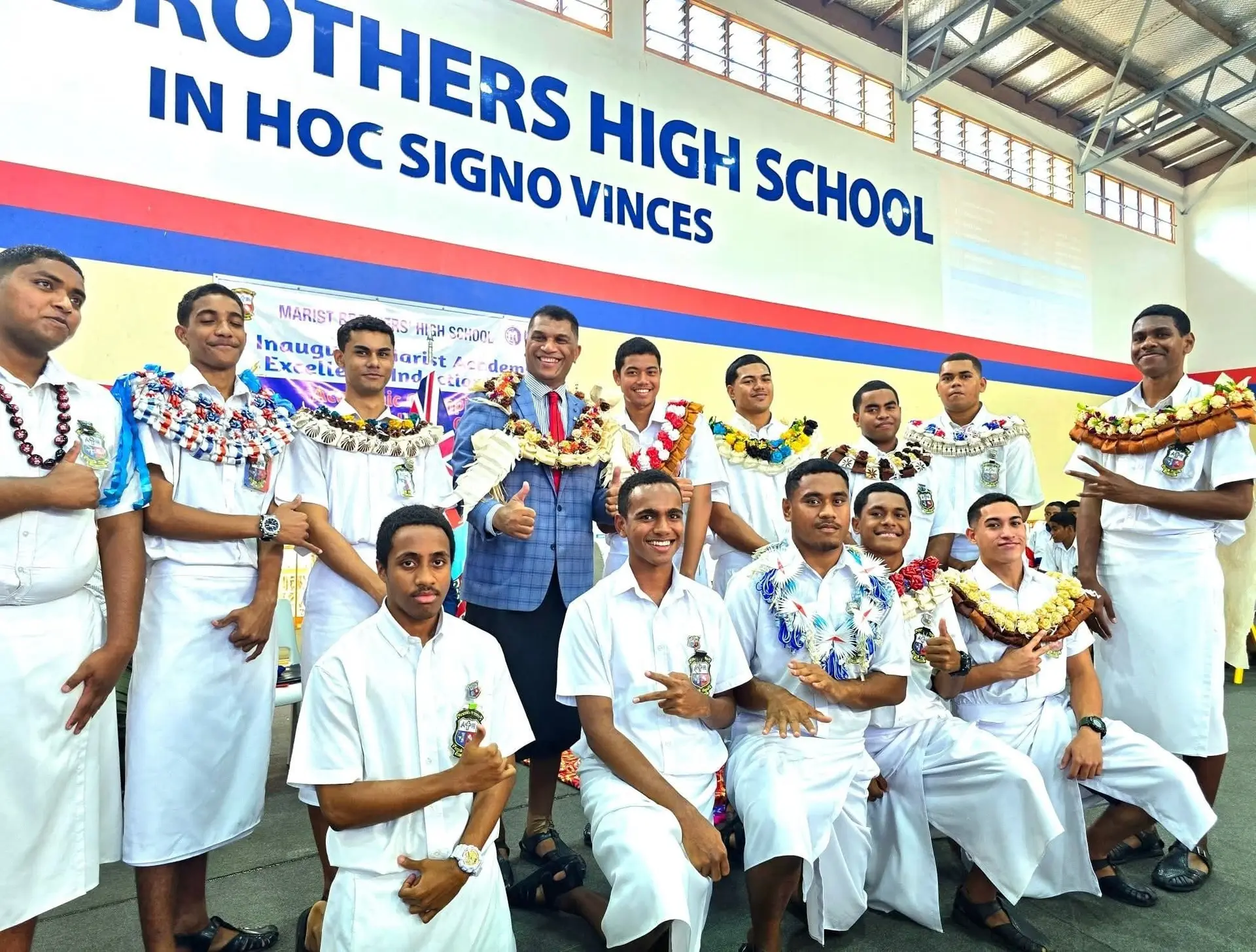 Minister for Education Aseri Radrodro with Marist Brothers High School students.