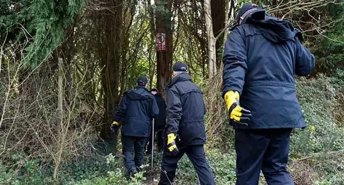 Police performing a search at the scene back in March 2020 where the baby was found dead in woodlands in Hythe, near Southampton. Photo: THE SUN