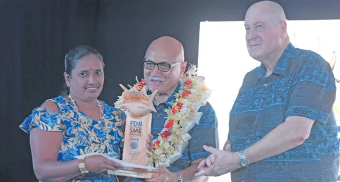 Gopal’s Meena Goundar receive her award from President Major-General Retired Joji Konrote.