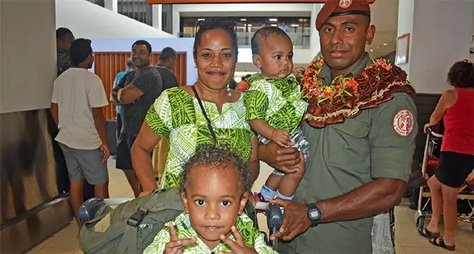 Corporal Apenisa Kuruiwaca with his wife, Paulini Kuruiwaca, and their sons Semiti James and Apenisa Junior at the Nadi International Airport after arriving from Sinai on March 22, 2019. Photo: Nicolette Chambers