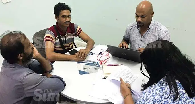 Fiji Human Rights And Anti-Discrimination Commission director Ashwin Raj in discussion with Bangladeshi nationals Kamroj Jaman and Mohammed Hossan in Suva on March 10, 2021. Photo: Inoke Rabonu