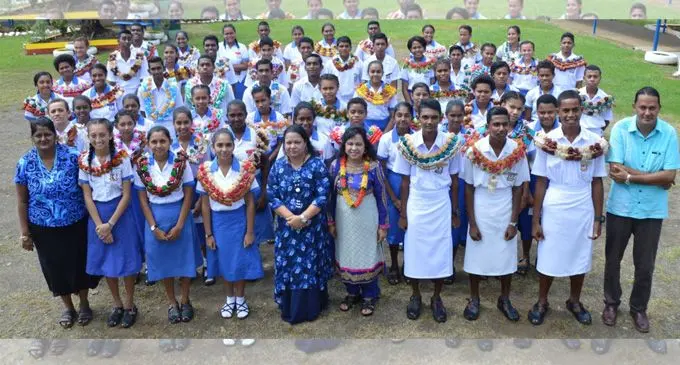 Fifth from left Mrs A. Singh [Principal] beside Mrs Nur Bano Hassan [Chief Guest] with newly inducted prefects of Lautoka Andhra Sangam College on February 16,2018. PHOTO: LAUTOKA ANDHRA COLLEGE