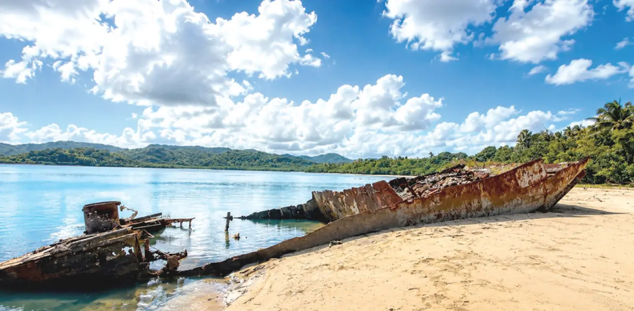 Two abandoned and derelict ships sitting on their shoreline in the coastal village of Culanuku in Serua Province. Photos: Talei Roko