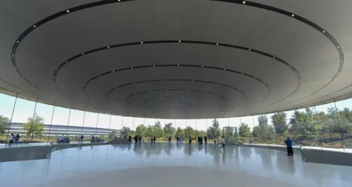 People walk inside the Steve Jobs Theater where a special event of Apple is held in Cupertino, California, the United States on Sept. 12, 2017. (Xinhua)