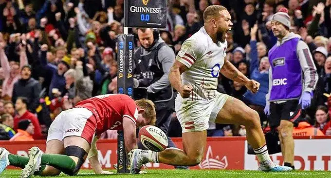 England’s Ollie Lawrence celebrates scoring their third try against Wales during their Six nations match at Principality Stadium, Cardiff, Wales, Britain on February 25, 2023. Photo: REUTERS/ Rebecca Naden