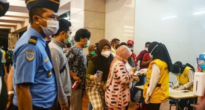 Relatives of the passengers on SJ-182 flight arrive at the crisis center at Soekarno-Hatta international airport in Jakarta, Indonesia, Jan. 9, 2021. (Xinhua/Agung Kuncahya B.)