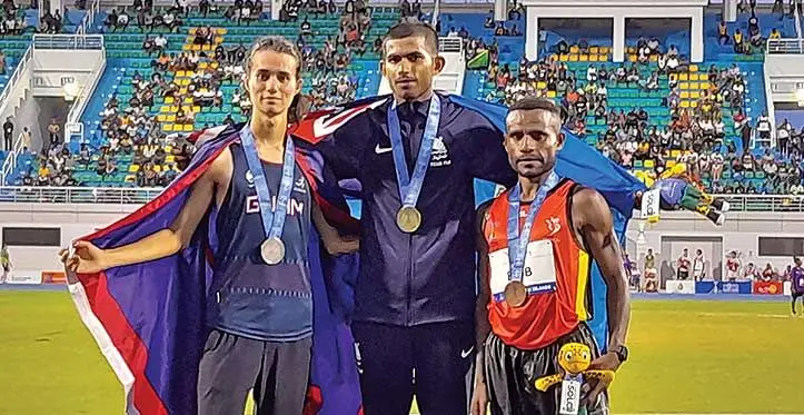 Yeshnil Karan middle) with Hugh Kent (left) of Guam, and Dilu Bob of Papua New Guinea at the National Stadium in Honiara, Solomon Islands on November 27, 2023. Photo: Waisea Nasokia