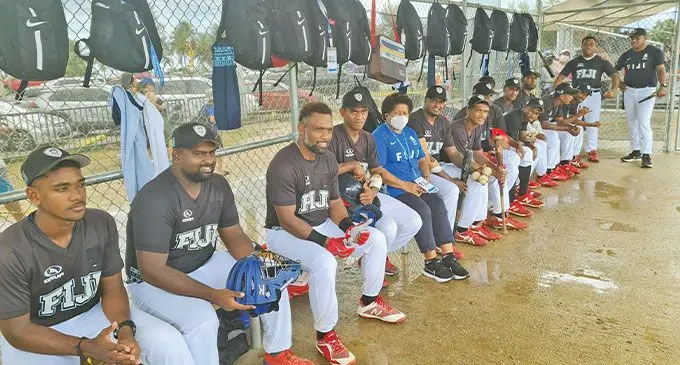 Team Fiji baseball team is visted by FASANOC president Makarita Lenoa (wearing mask) during the Northern Marianas Pacific Mini Games in Saipan on June 18, 2022. Photo: FASANOC