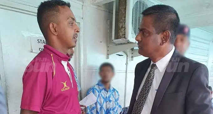 Lawyer Jitend Reddy (right) with his client Anit Kishore outside the Magistrates Court in Nasinu.