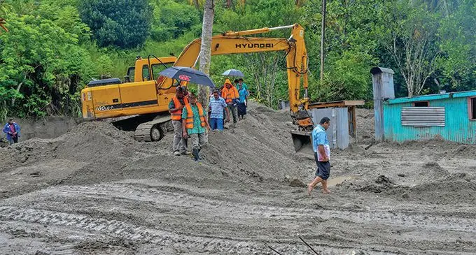 Minister for Infrastructure, Transport, Disaster Management and Meteorological Services, Jone Usamate witnessed firsthand the damge done by the landslide on February 18, 2019. Photo: DEPTFO News