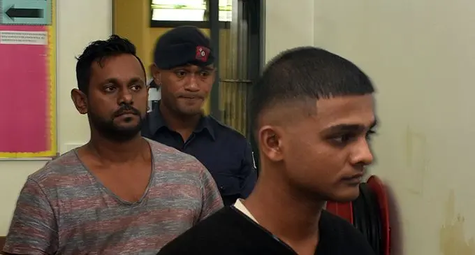 Justin Robert with Vicky Kumar at the Nadi Magistrate Court yesterday. Photo: WAISEA NASOKIA