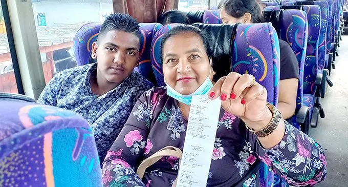 Sunila Devi 62 with grandson, Bal Krishna are happy with the 10 per cent  Government assistance in busfare from 1st of August , 2022. Photo: Ronald Kumar