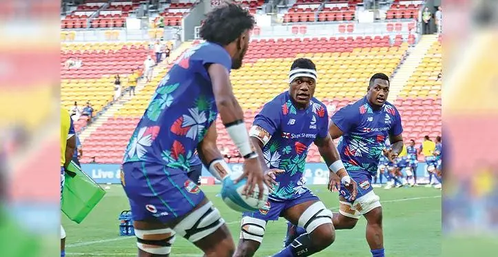 From left: Swire Shipping Fijian Drua reps Isoa Nasilasila, Elia Canakaivata and Te Ahiwaru Cirkidaveta at Suncorp Stadium, Brisbane, on Sunday. Photo: Fijian Drua