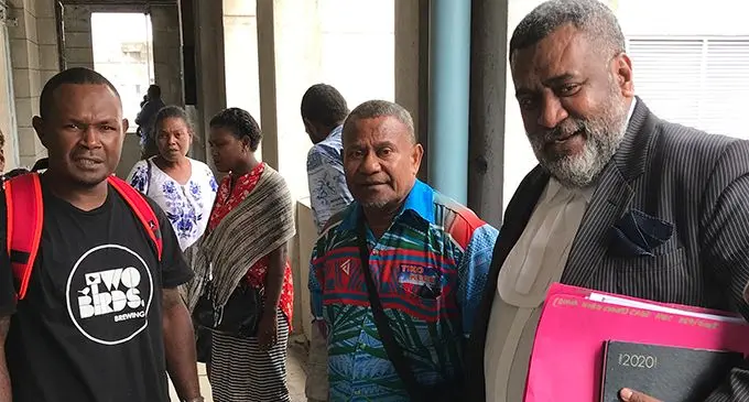 Lawyer Nemani Tuifagalele (right) with the residents and evicted families of Tamavua-i-Wai settlement outside the Civil High Court in Suva on February 5, 2020.  Photo: Ashna Kumar
