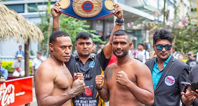 Veteran boxer Savenaca Naliva ( left) and his opponent Sebastian Singh.