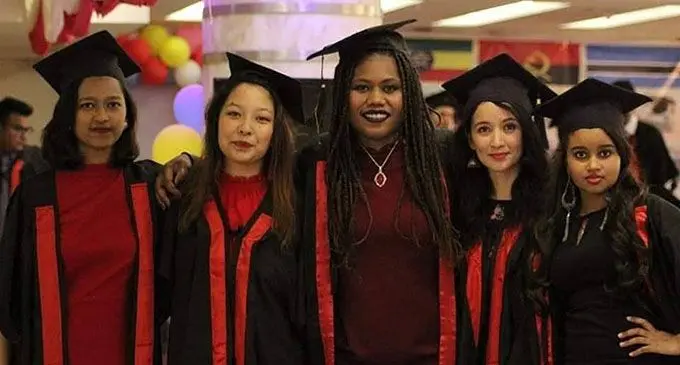 Adiciba Rokobani (third from left) with fellow graduates.