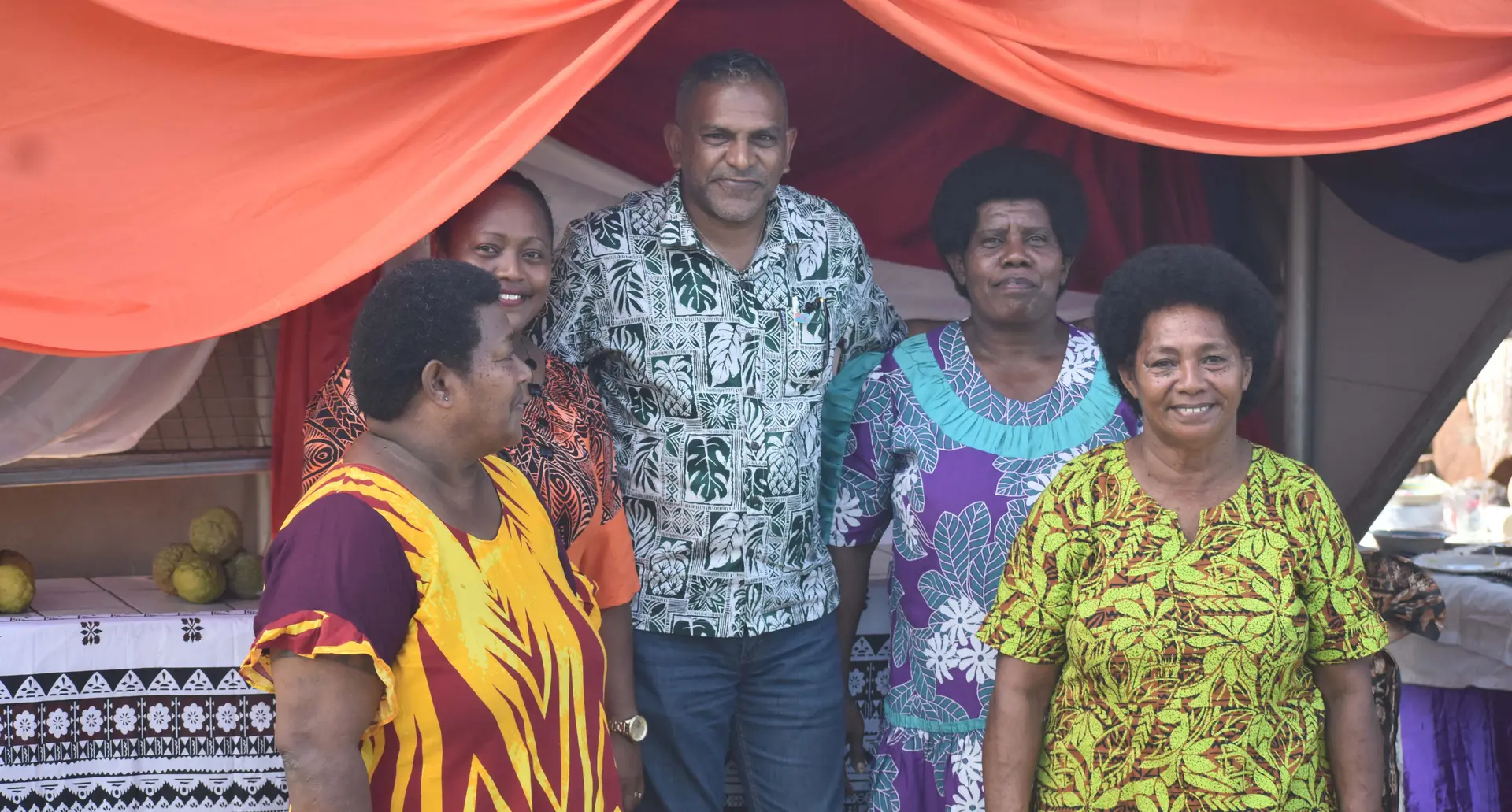 Minister for Commerce, Trade, Tourism and Transport Faiyaz Koya with a group of women along the Tabia highway on November 5, 2020. 