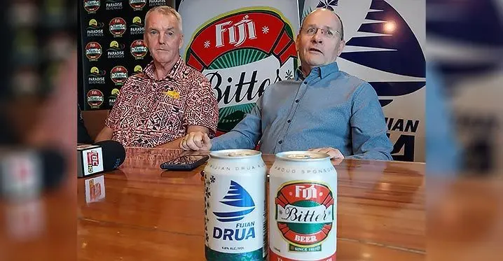 Paradise Beverage general manager, Michael Spencer (left), and Fijian Drua chief executive officer, Mark Evans, during the release of the special edition Fijian Drua Fiji Bitter commemorative can on February 21, 2023. Photo: Nacanieli Tuilevuka