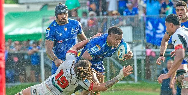 Swire Shipping Fijian Drua flanker Motikiai Murray fends off Chiefs lock Naitoa Ah Kuoi during their Shop N Save Super Rugby Pacific clash at Lautoka’s Churchill Park on March 8, 2025. Talks for funding spearheaded by director rugby Koli Sewabu are now underway and if successful could see Fiji Rugby has its own stadium. Photo: Leon Lord