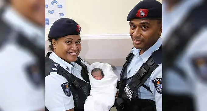 Raiwaqa Police Station, Inspector Raijeli Kunakata and Constable Vanaisa Dranivesi holding the newborn baby they assisted in delivering at a woman’s house in Raiwaqa, Suva on December 14, 2022. Photo: Fiji Police Force