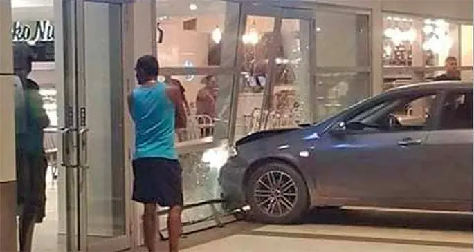 The vehicle plunged into the door of a restaurant at the Nadi International Airport Terminal. Photo: Facebook