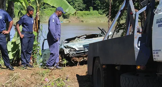 Police and Fire Authority officers recover the car that was driven by the late Taslim Ali in Baulevu Nausori on April 29,2019.Photo:Simione Haravanua.