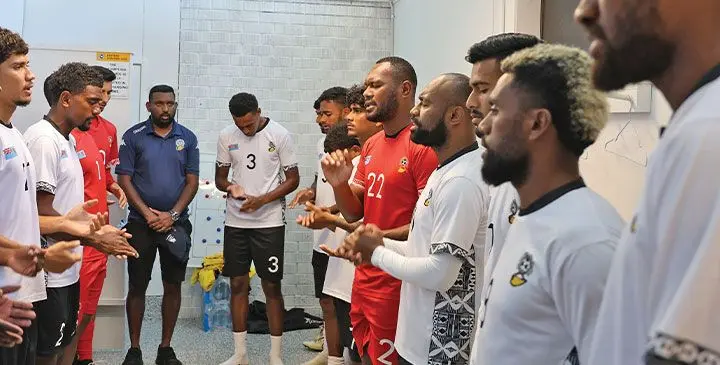 Fiji men’s football veteran goalkeeper Akuila Mateisuva (fifth from right) leads the team during their devotion in Auckland, New Zealand, on March 11, 2025. The national team remained unbeaten after their three warm-up matches and are now in Wellington for Friday’s semi-final of the FIFA World Cup 2026 Oceania Qualifiers against New Zealand. Photo: Supplied
