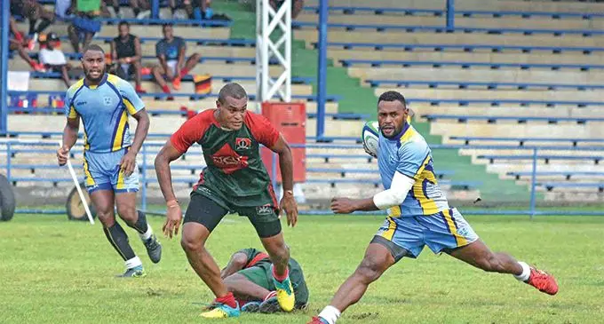 Ratu Filise's Amenoni Nasilasila in control against Red Diamond 3 FIR during the 6 th Martintar 7's at the Prince Charles Park in Nadi yesterday. Photo: WAISEA NASOKIA