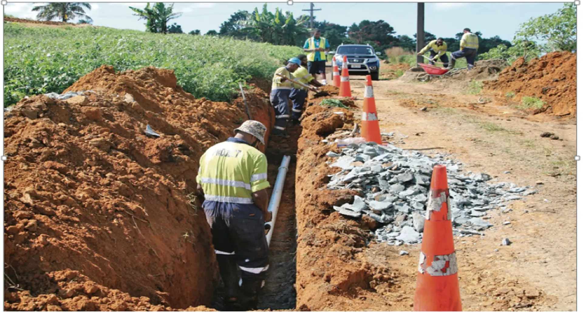 WAF crew members laying water pipes in Wainibuku Photo: Water Authority of Fiji