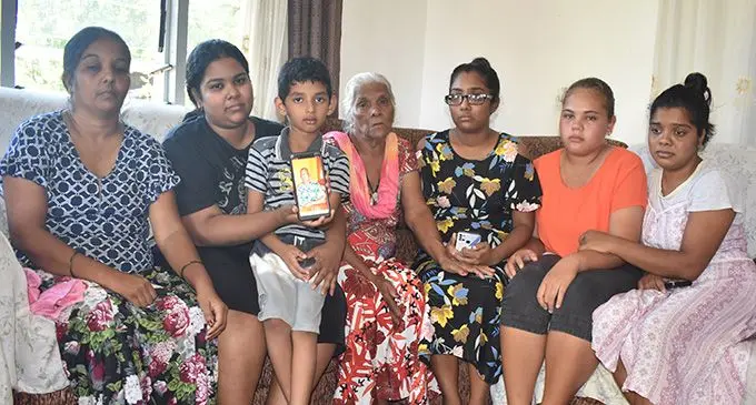From left: Minalta Devi (wife of the victim), Swastika Raj, Izal Ali, Kamla Wati (victim’s mother), Kristine Raj, Talica Toga and Shahista Chand at Votualevu in Nadi. Photo: Mereleki Nai. Inset: The late Rajendra Raj