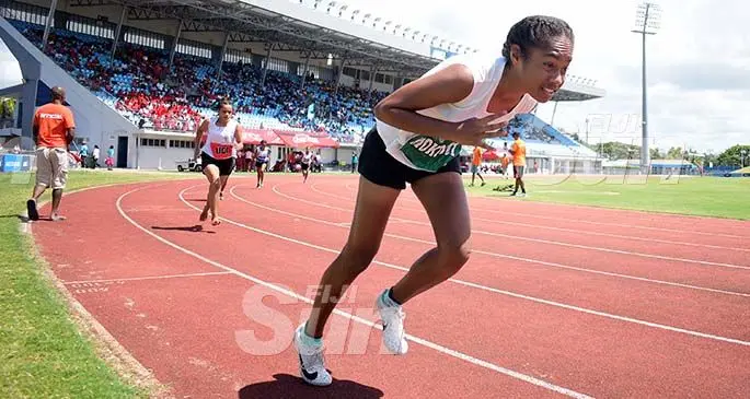 Ofa Puamau (right) of Mokosoi House leads the Adi Cakobau School (ACS) inter-girls 400metres heats at the ANZ Stadium in Suva on February 22, 2020. Photo: Ronald Kumar