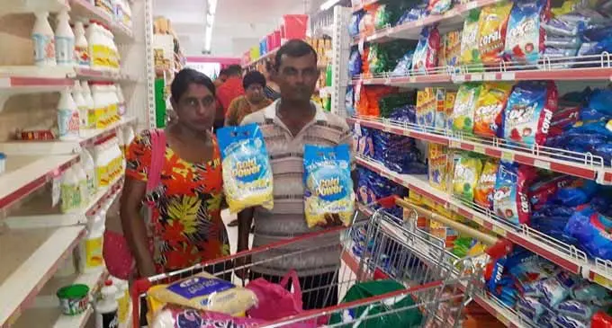 Karuna Devi with her husband Vimal Deo shopping at Max Val-u  supermarket on  February 7, 2018. Photo: Wati Talebula.
