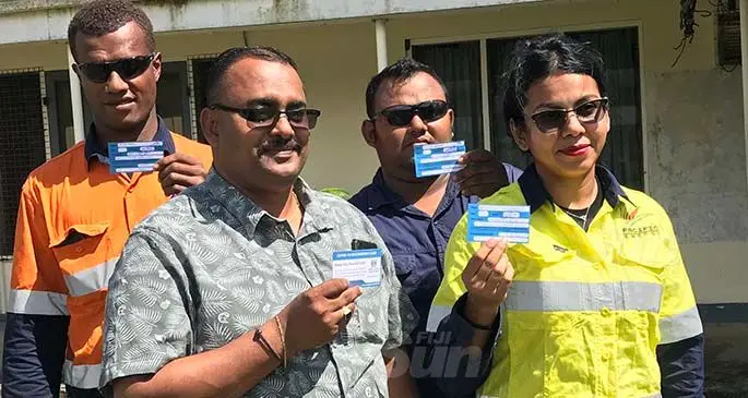 Staff from Pacific Energy Savusavu Terminal with their appointment card for dose two after receiving the Astra Zeneca Vaccine at the Savusavu Hospital on March 12, 2021. Photo: Laisa Lui.