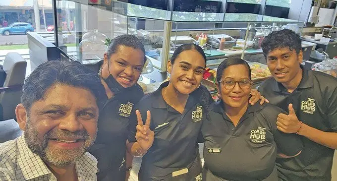 Aiyaz Sayed-Khaiyum with people in the West.