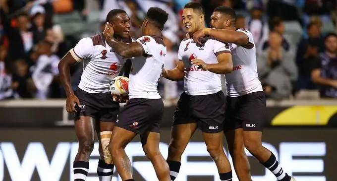 Vodafone Fijian Bati rugby players celebrate after Suliasi Vunivalu (left), scores during the 2017 Rugby League World Cup in Australia. Photo: Zimbio.