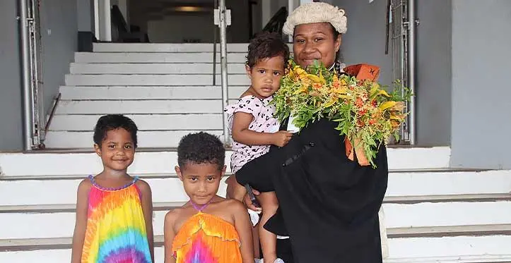 New lawyer Arieta Rarawa Naisake with her children at the Fiji National University bar admission on November 7, 2023. Photo: Asenaca Ratu