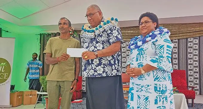 (From left) Rice farmer Rishi Ram receives his best farmer of the year (male) award from President Ratu Wiliame Katonivere in Labasa, on October 12, 2024. To the right is First Lady, Adi Filomena Katonivere. Photo: Sampras Anand