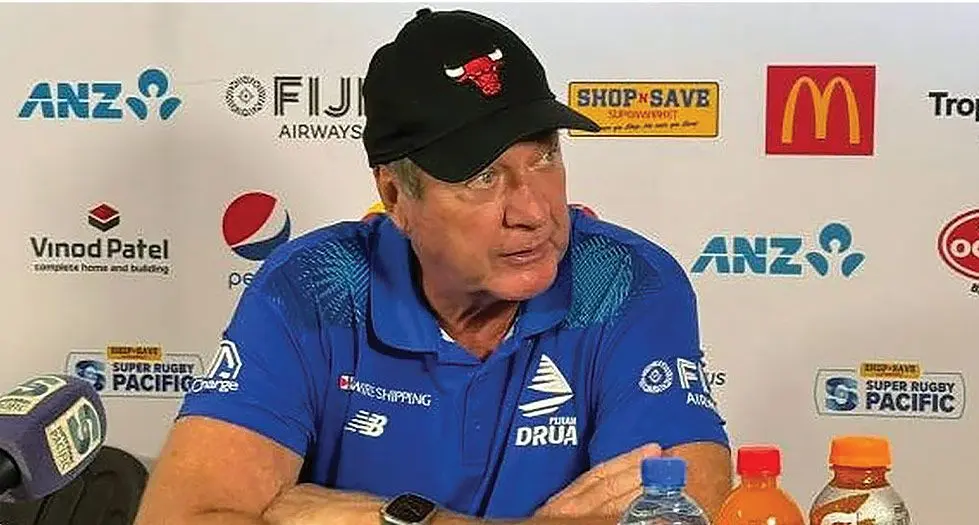 Fijian Drua coach Mick Byrne wearing a Chicago Bull cap. 