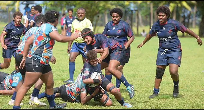 Suva defends against Nadi in the senior clash of the ANZ Marama Championship at the Suva Grammar School ground today. Suva won 34-7. Photo: Ronald Kumar 