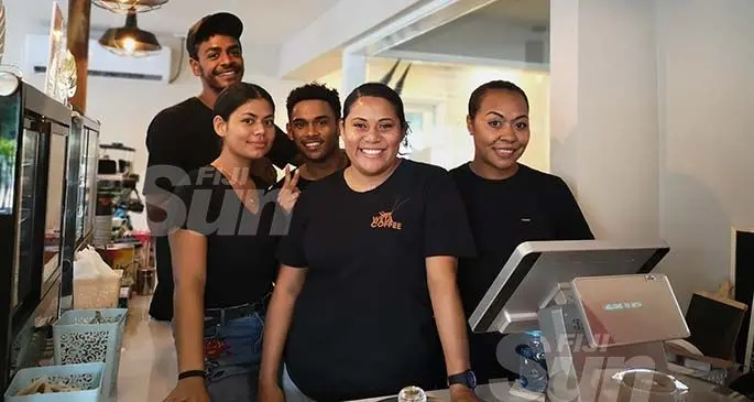 From left: Weta Coffee (Fiji) staff Patrick Yalovinala, Sera Maca, David Natula (third from right) Catherine Mataki and Mavis Whippy. Photo: Laiseana Nasiga