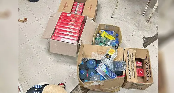Undeclared cigarettes and illegal substances hidden in used bottles.