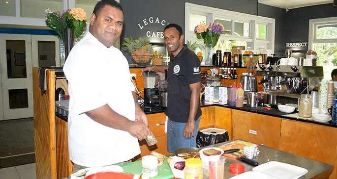 Apetia Tui (left) and Mikaele Gukibau of Legacy Cafe and Health Bar at Pacific Harbour, prepare orders for home delivery on April 16, 2020.
