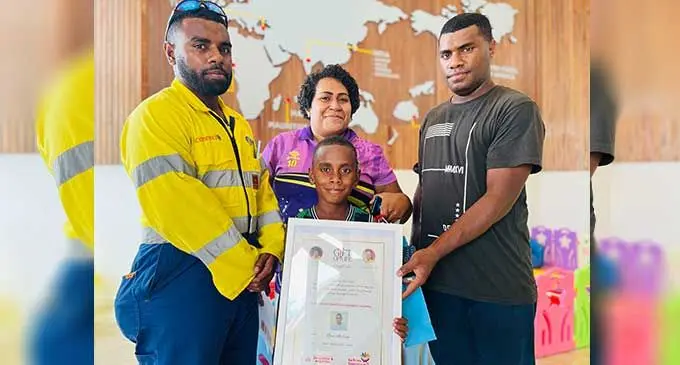 From left: Peni Bukete with Malakai Junior, mother Unaisi Nadroi and father Sunia Naulago after he was discharged from the Sri Sathya Sai Sanjeevani children’s hospital in Suva on September 26. Photo: Nolishma Narayan