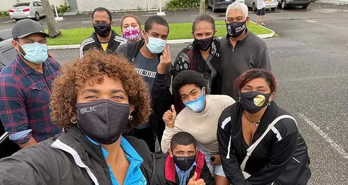 Matila Vocea takes a selfie with her family at the Holiday Inn in Suva.
