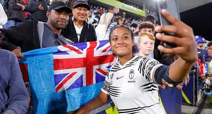 Rooster Chicken Fijiana XVs captain Asinate Serevi takes a selfie with fans at the Northland Events Centre in Auckland, New Zealand on October 22, 2022. France scored sevens tries to win 44-0 while the Fijiana ended their World Cup run. Photo: World Rugby