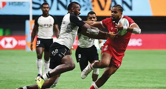Sevuloni Mocenacagi closes in to tackle a Canadian player at the HSBC Vanouver sevens on February 24, 2024. Photo: World Rugby