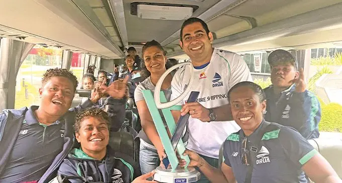 From left: Vika Matarugu, Jiowana Sauto with Rooster Chicken chief executive officer Stanley Raniga and wife Catherine Raju, with Raijeli Uluiinayau and Vitalina Naikore (back) inside their bus after their win in Melbourne on April 23, 2022. Photo:SUPPLIED