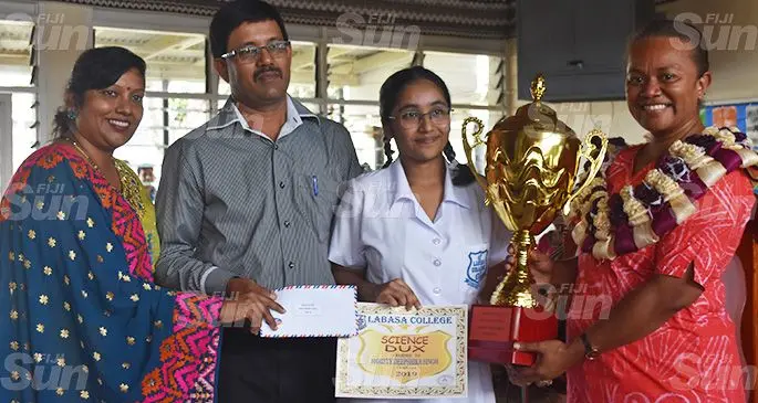 Labasa College science Dux Shristy Deepika Singh (third from left) with her parents while receiving her awards from the Divisional Education Officer Northern Iliseva Volai on October 11, 2019. Photo: Laisa Lui.