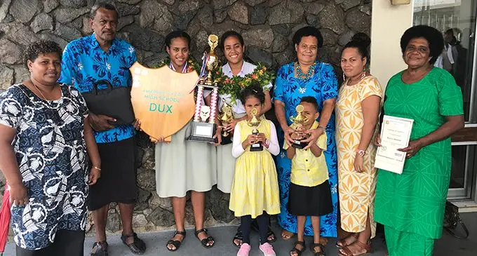 Assembly of God High School Dux Viva Degei Buarua (third from left) with her family after the prize giving ceremony at Calvary Temple in Samabula on October 9, 2019. Photo: Wati Talebula